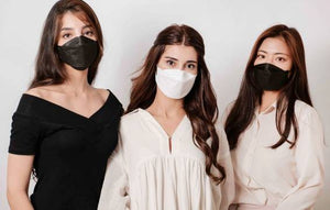 korean mask worn by three adult females