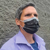 adult male wearing a black usa made 3ply surgical style mask